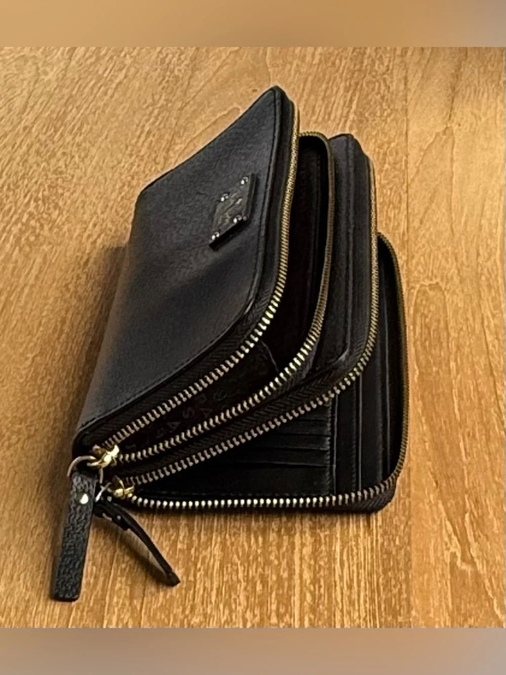 Kate Spade Black Pebbled Leather Zip-around Wallet with Gold Studs